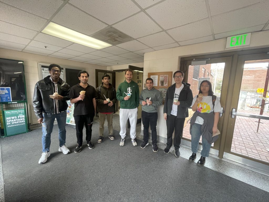 DeepTech Lab students and researchers standing together in the Engineering Building at Michigan State University